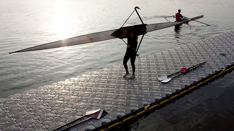 rowing dock with person walking